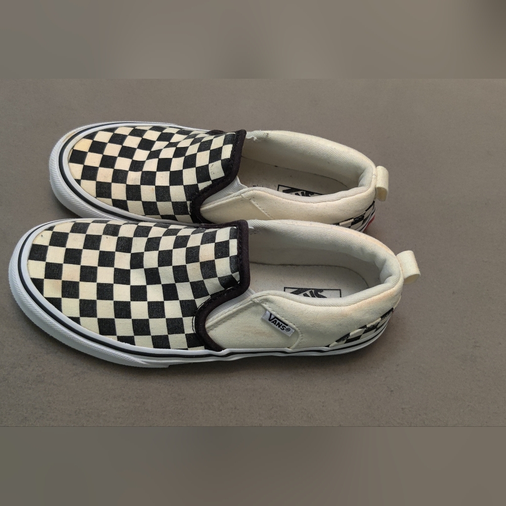 Vans kids slip on sneakers